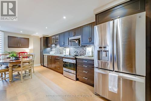 704 - 700 Wilson Road N, Oshawa (Centennial), ON - Indoor Photo Showing Kitchen With Upgraded Kitchen