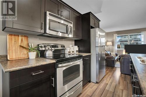 220 Langlois Way, Saskatoon, SK - Indoor Photo Showing Kitchen With Stainless Steel Kitchen With Double Sink