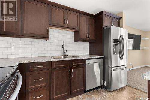 67 Mathieu Crescent, Regina, SK - Indoor Photo Showing Kitchen With Double Sink