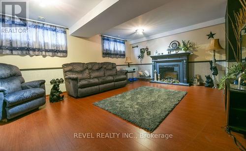 141 Malette Crescent, Timmins (Tnw - Riverpark), ON - Indoor Photo Showing Living Room With Fireplace