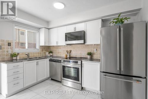 94 - 1168 Arena Road, Mississauga, ON - Indoor Photo Showing Kitchen With Stainless Steel Kitchen With Double Sink