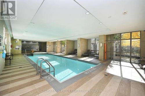 414 - 2480 Prince Michael Drive, Oakville, ON - Indoor Photo Showing Other Room With In Ground Pool