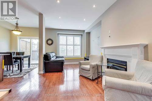 7 - 300 Ravineview Way S, Oakville, ON - Indoor Photo Showing Living Room With Fireplace