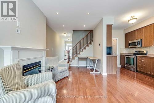 7 - 300 Ravineview Way S, Oakville, ON - Indoor With Fireplace