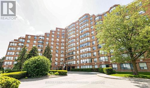 319 - 6 Humberline Drive, Toronto, ON - Outdoor With Facade