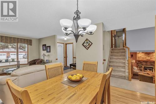 478 Anglin Court, Saskatoon, SK - Indoor Photo Showing Dining Room With Fireplace