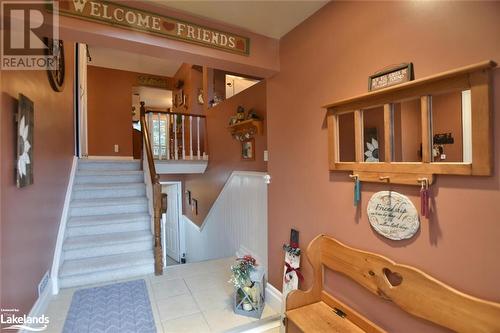 Staircase featuring tile patterned flooring - 97 Glen Eton Road, Wasaga Beach, ON 