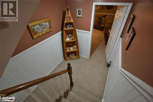 Stairway featuring carpet flooring - 97 Glen Eton Road, Wasaga Beach, ON 