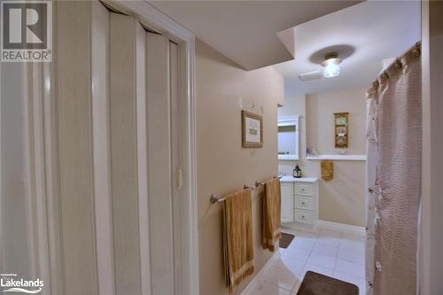 Bathroom with tile patterned floors and vanity - 97 Glen Eton Road, Wasaga Beach, ON 