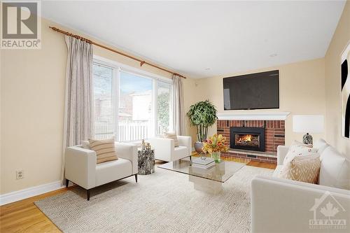 Virtually Staged - 372 River Ridge Crescent, Ottawa, ON - Indoor Photo Showing Living Room With Fireplace