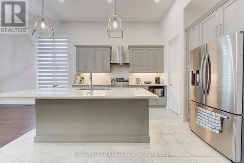 57 - 6990 Clayton Walk, London, ON - Indoor Photo Showing Kitchen With Upgraded Kitchen