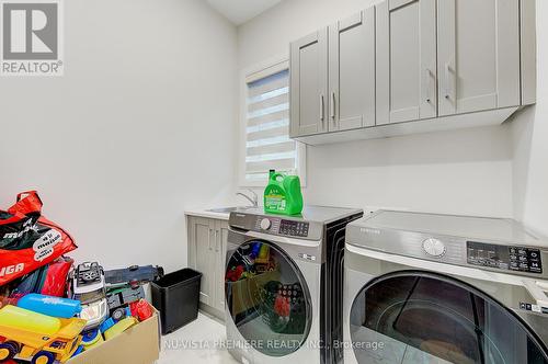 57 - 6990 Clayton Walk, London, ON - Indoor Photo Showing Laundry Room