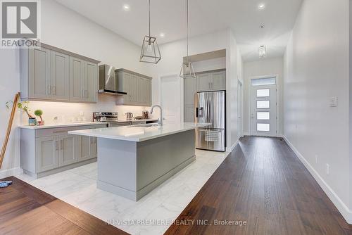 57 - 6990 Clayton Walk, London, ON - Indoor Photo Showing Kitchen With Upgraded Kitchen