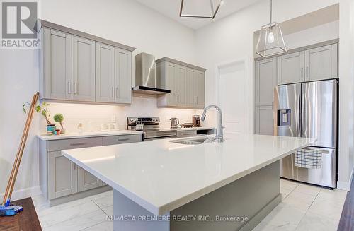 57 - 6990 Clayton Walk, London, ON - Indoor Photo Showing Kitchen With Upgraded Kitchen