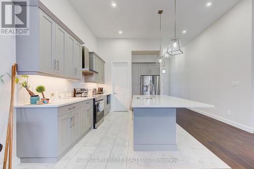 57 - 6990 Clayton Walk, London, ON - Indoor Photo Showing Kitchen With Upgraded Kitchen