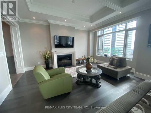 4701 - 311 Bay Street, Toronto, ON - Indoor Photo Showing Living Room With Fireplace