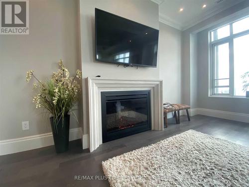 4701 - 311 Bay Street, Toronto, ON - Indoor Photo Showing Living Room With Fireplace