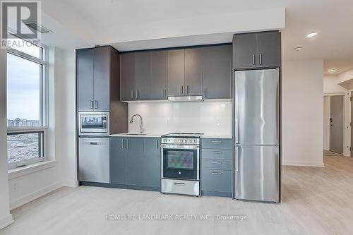 A1605 - 30 Upper Mall Way, Vaughan, ON - Indoor Photo Showing Kitchen With Upgraded Kitchen