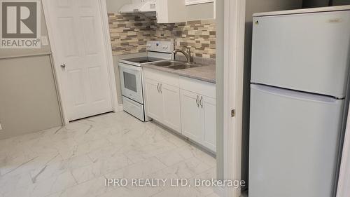 296 Hickling Trail, Barrie, ON - Indoor Photo Showing Kitchen With Double Sink