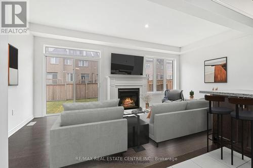 12 Heming Trail, Hamilton, ON - Indoor Photo Showing Living Room With Fireplace