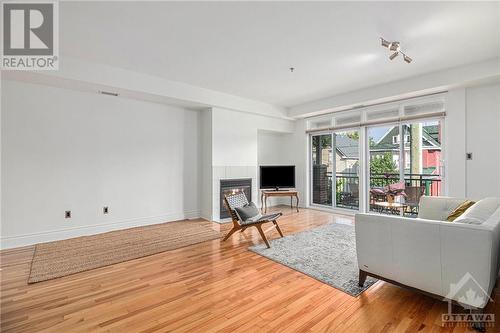 400 Mcleod Street, Ottawa, ON - Indoor Photo Showing Living Room With Fireplace