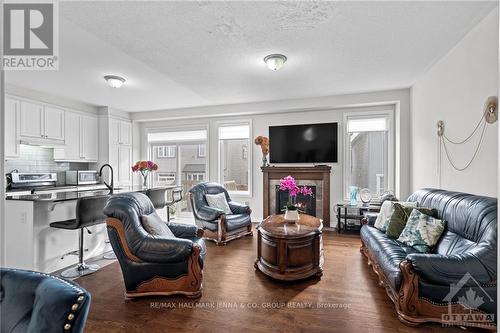 716 Summergaze Street, Ottawa, ON - Indoor Photo Showing Living Room With Fireplace