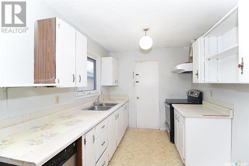 58 Hooper Bay, Regina, SK - Indoor Photo Showing Kitchen With Double Sink