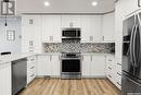 2810 More Crescent E, Regina, SK  - Indoor Photo Showing Kitchen With Stainless Steel Kitchen With Upgraded Kitchen 