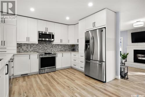 2810 More Crescent E, Regina, SK - Indoor Photo Showing Kitchen With Stainless Steel Kitchen With Upgraded Kitchen