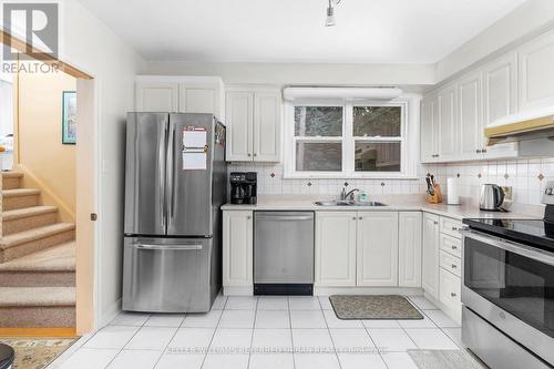 103 Holcolm Road, Toronto, ON - Indoor Photo Showing Kitchen With Double Sink