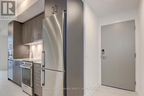 A1606 - 30 Upper Mall Way, Vaughan, ON - Indoor Photo Showing Kitchen