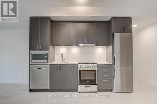 A1606 - 30 Upper Mall Way, Vaughan, ON - Indoor Photo Showing Kitchen