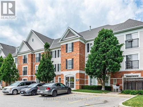 204 - 90 Aspen Springs Drive W, Clarington, ON - Outdoor With Facade