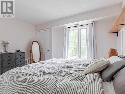 204 - 90 Aspen Springs Drive W, Clarington, ON - Indoor Photo Showing Bedroom