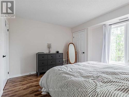 204 - 90 Aspen Springs Drive W, Clarington, ON - Indoor Photo Showing Bedroom