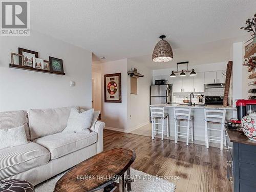 204 - 90 Aspen Springs Drive W, Clarington, ON - Indoor Photo Showing Living Room