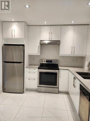 Upper - 18 Cabot Court, Toronto, ON - Indoor Photo Showing Kitchen With Double Sink