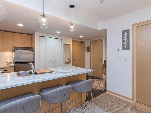 205-787 Tyee Rd, Victoria, BC - Indoor Photo Showing Kitchen With Double Sink