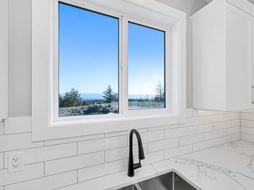 7063 Brailsford Pl, Sooke, BC - Indoor Photo Showing Kitchen With Double Sink