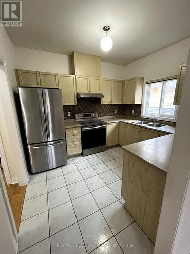 Upper - 9 Denim Drive, Brampton, ON - Indoor Photo Showing Kitchen With Double Sink