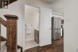 Bathroom with vanity and hardwood / wood-style flooring - 