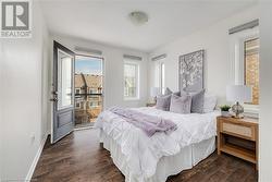 Bedroom with dark wood-type flooring - 