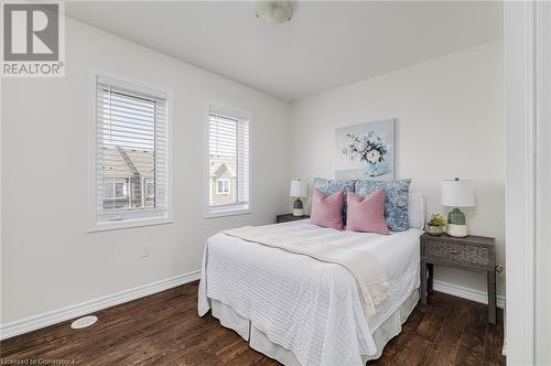 Bedroom featuring dark hardwood / wood-style floors - 577 Goldenrod Lane, Kitchener, ON - Indoor Photo Showing Bedroom