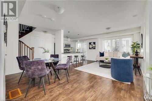 Dining space featuring wood-type flooring - 577 Goldenrod Lane, Kitchener, ON - Indoor Photo Showing Dining Room