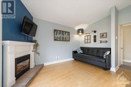 370 Duvernay Drive, Orleans - Cumberland And Area (1104 - Queenswood Heights South), ON - Indoor Photo Showing Living Room With Fireplace