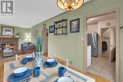 980 Ypres, Windsor, ON - Indoor Photo Showing Dining Room With Fireplace