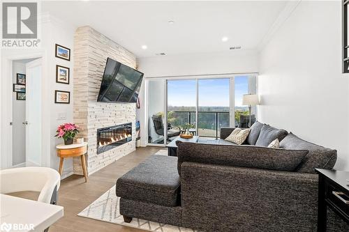 1880 Gordon Street Unit# 801, Guelph, ON - Indoor Photo Showing Living Room With Fireplace