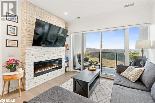 1880 Gordon Street Unit# 801, Guelph, ON - Indoor Photo Showing Living Room With Fireplace