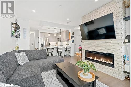 1880 Gordon Street Unit# 801, Guelph, ON - Indoor Photo Showing Living Room With Fireplace