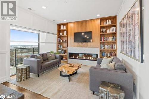 1880 Gordon Street Unit# 801, Guelph, ON - Indoor Photo Showing Living Room With Fireplace